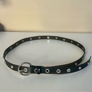 Y2K style thin translucent black rubber belt with silver studs and rivet